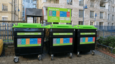 Making recycling work for people in flats: image of three large recycling bins
