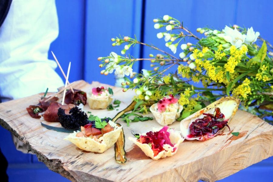 Canapes Elysia Catering. Array of zero-waste food presented on a wooden board